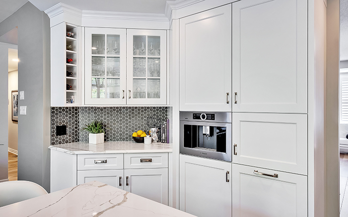 White custom cabinetry with recessed panels
