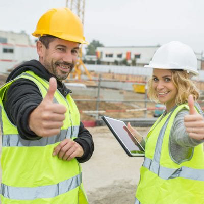 2 contractors in safety gear 