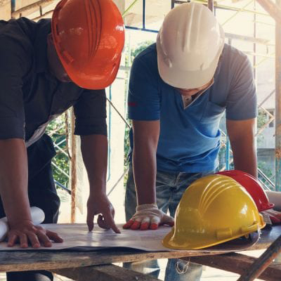 turnkey installation OakWood certified contractors looking at a blueprint
