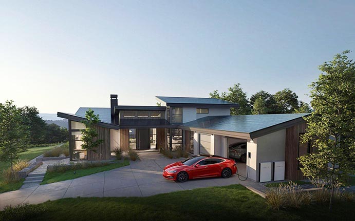 home renovations ottawa: Beautiful custom home with red Tesla car in front of garage